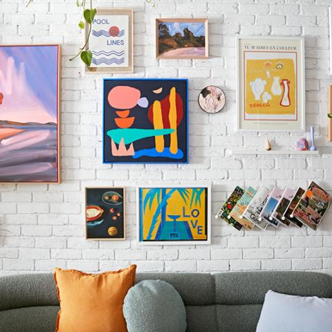 Art hang in a living room studio style.